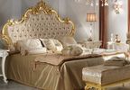 Кровать Diamante 2102 с мягким стеганным  изголовьем с волнистым резным золотым обрамлением и золотым корпусом 180х200